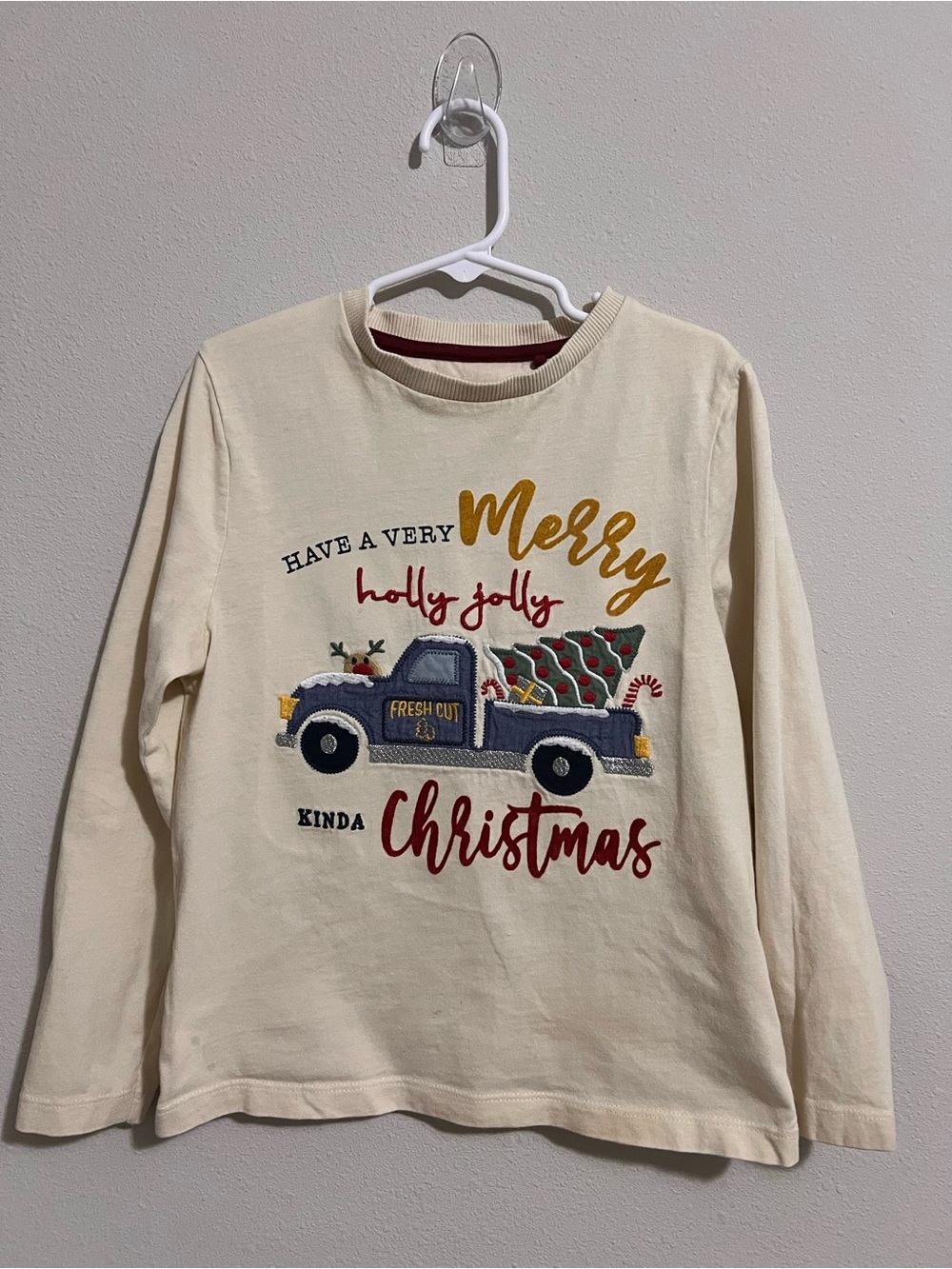 Cactus Cream Long-Sleeve Holiday Truck Top with Red and Gold Accents